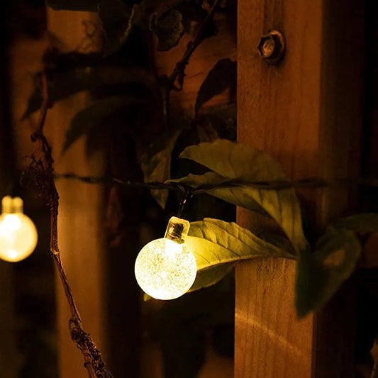 Kit Terraza Kandrano - guirnalda solar encendida de noche en valla