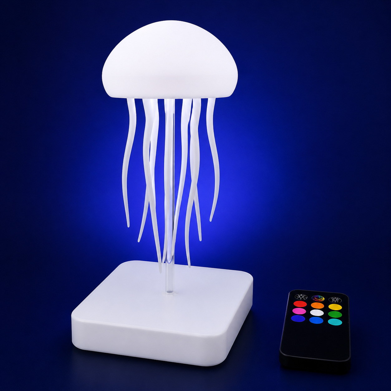Kandrano Medusa, lámpara LED decorativa con base blanca sobre fondo azul noche